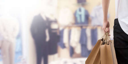 young with shopping bags shopping and shopping mallの写真素材