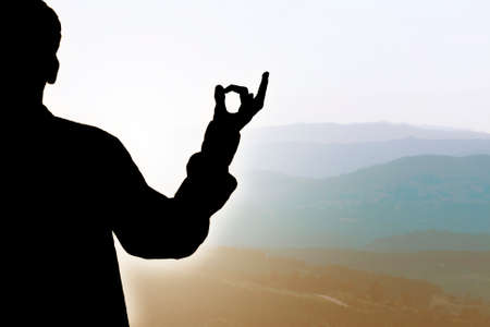 silhouette with meditation and yoga gestureの写真素材