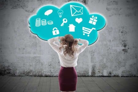 business woman with digital content cloudの写真素材