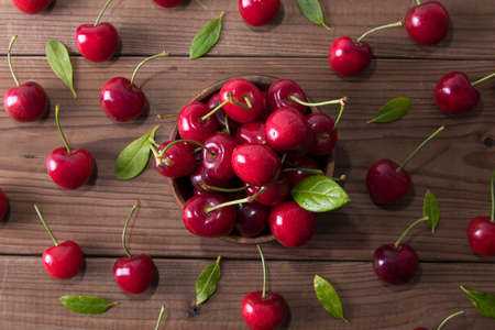 natural cherries on rustic wood