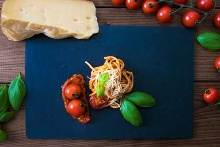 spaguetis pasta with salsa and cheese, mediterranean creative dietの写真素材
