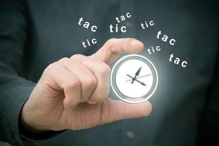 hand with clock, timetable and time pass