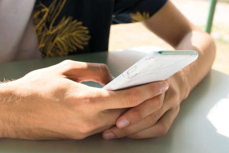 hands with mobile phone, smartphone