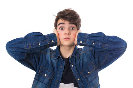 adolescent covering her the earsの写真素材