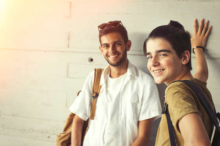 young students with books on campus or collegeの写真素材