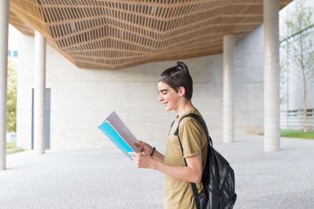 student with book backpackの写真素材