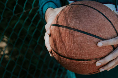 young athlete with basketballの写真素材