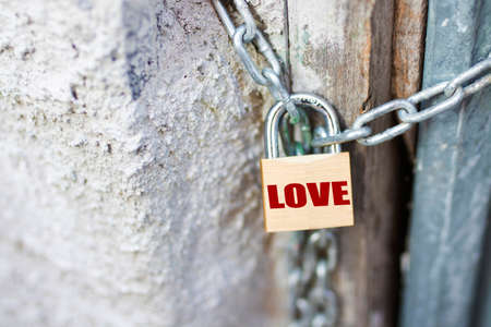 message of love in the padlock closed with chainの写真素材