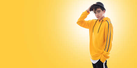 young teenager to fashion isolated in backgroundの写真素材