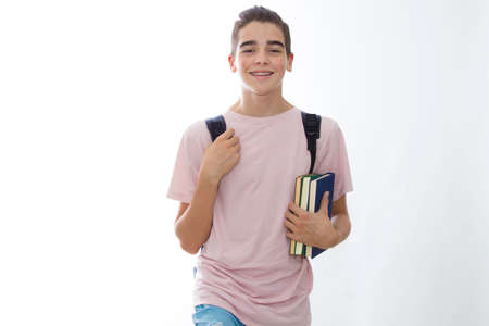 student with books and backpack isolated in white background