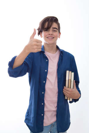 student with books isolated in white backgroundの写真素材