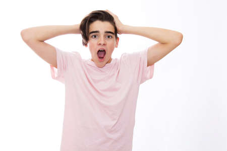 young isolated with expression of surpriseの写真素材