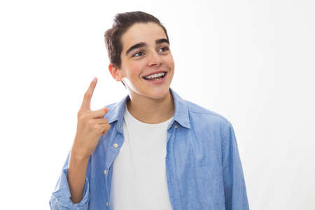 young isolated pointing up with the fingerの写真素材