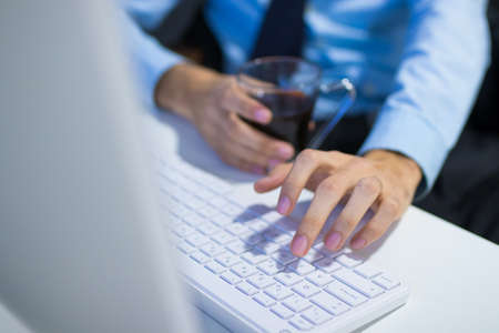 business man hands typing on computerの写真素材