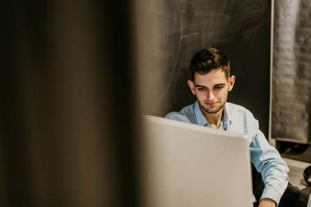 businessman in the office behind the computerの写真素材
