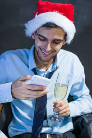businessman in the office celebrating christmasの写真素材