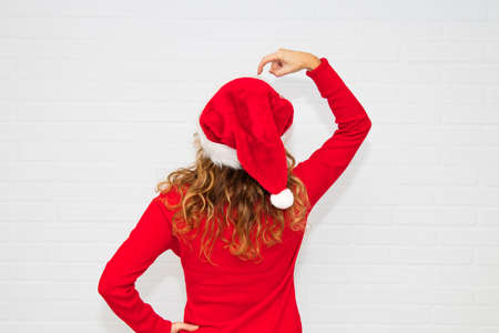 woman with christmas cap and white backgroundの写真素材