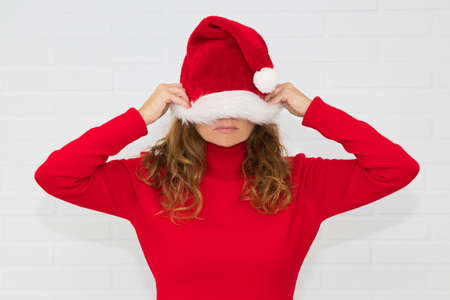 woman with christmas cap and white background