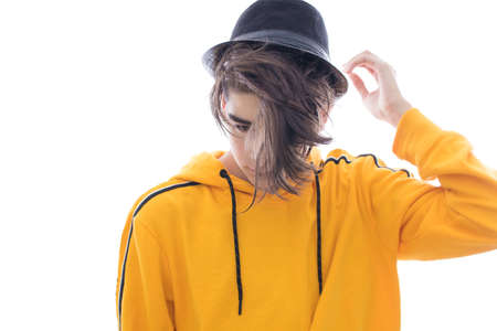 young fashioned teenager isolated in white backgroundの写真素材