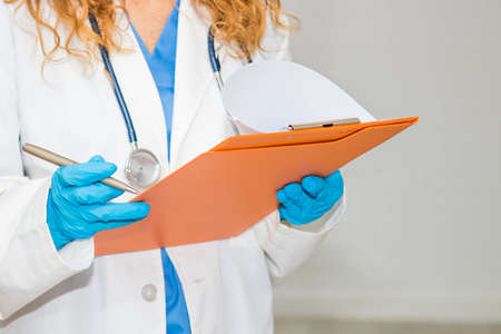 doctor with report folder or clinical historyの写真素材