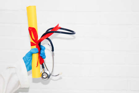 doctor with diploma and graduation in medicine