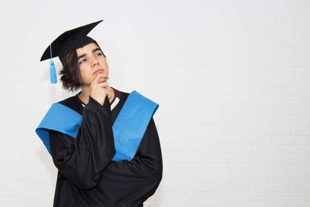 young isolated in a graduation suitの写真素材