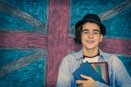 student with books and english flag, learn englishの写真素材