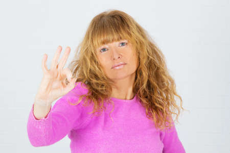 adult woman with pink jersey isolated in white background