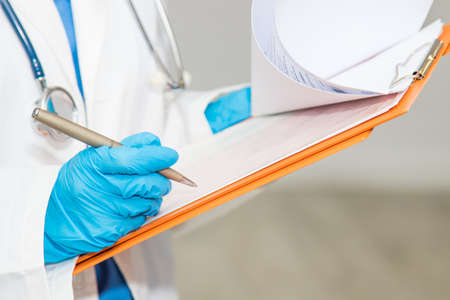 doctor with report folder or clinical historyの写真素材