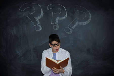 young man with book and question