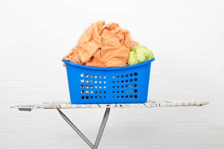 clothes stacked in the basket washed or washedの写真素材