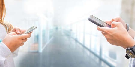 students with mobile phones in school