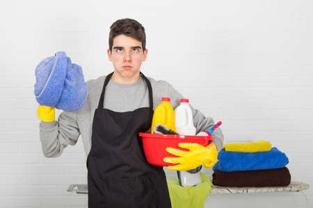 man with household and household cleaning products