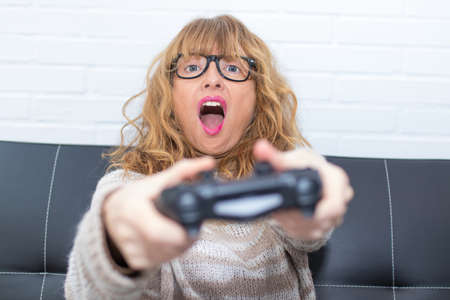 adult woman playing video games