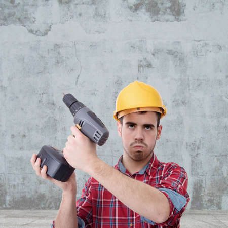 constructor with drill, renovations, repairs and bricolageの写真素材