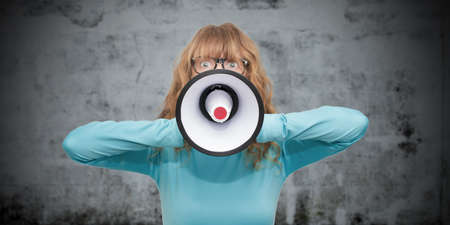 adult woman with megaphoneの写真素材