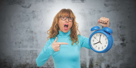 isolated woman with clock or alarm