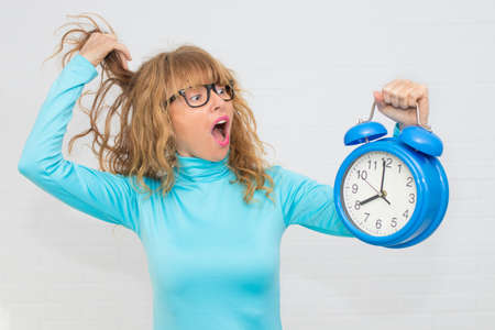 isolated woman with clock or alarm