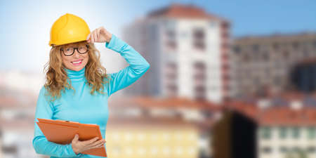 woman building, architect or real estate with houses and buildingsの写真素材