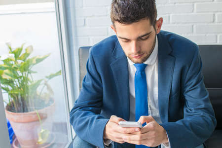 business man with mobile phoneの写真素材