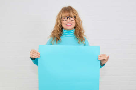 woman with poster or space for text