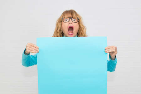 woman with poster or space for text