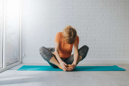 woman exercising at home or gym