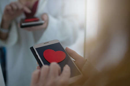 sexy woman with mobile phoneの写真素材