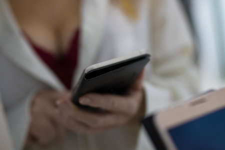 sexy woman with mobile phoneの写真素材