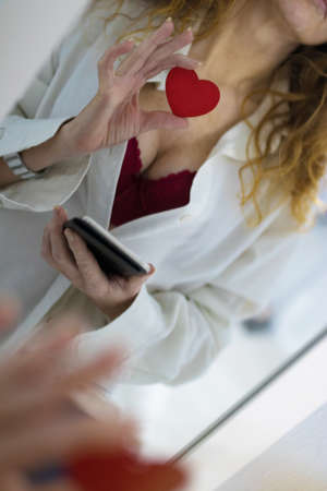 sexy woman with mobile phoneの写真素材