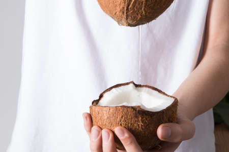 water or natural coconut oil