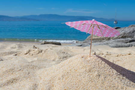 parasol in the sand of the beach, summer and holidaysの写真素材