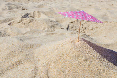 parasol in the sand of the beach, summer and holidaysの写真素材
