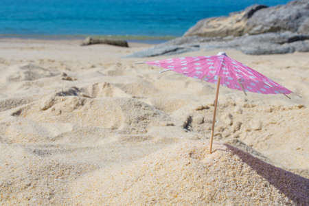 parasol in the sand of the beach, summer and holidaysの写真素材